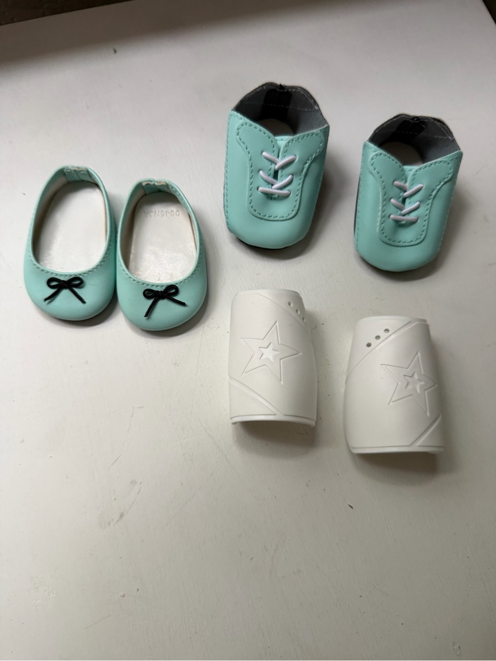 American Girl soccer shoes and addition pair of shoes